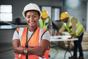 Services portrait of a confident young woman working at a construction site